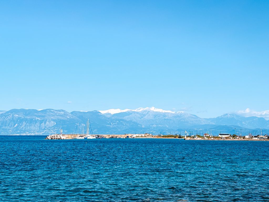 Mediterranean Sea and snow-covered mountains in the Peloponnese in winter