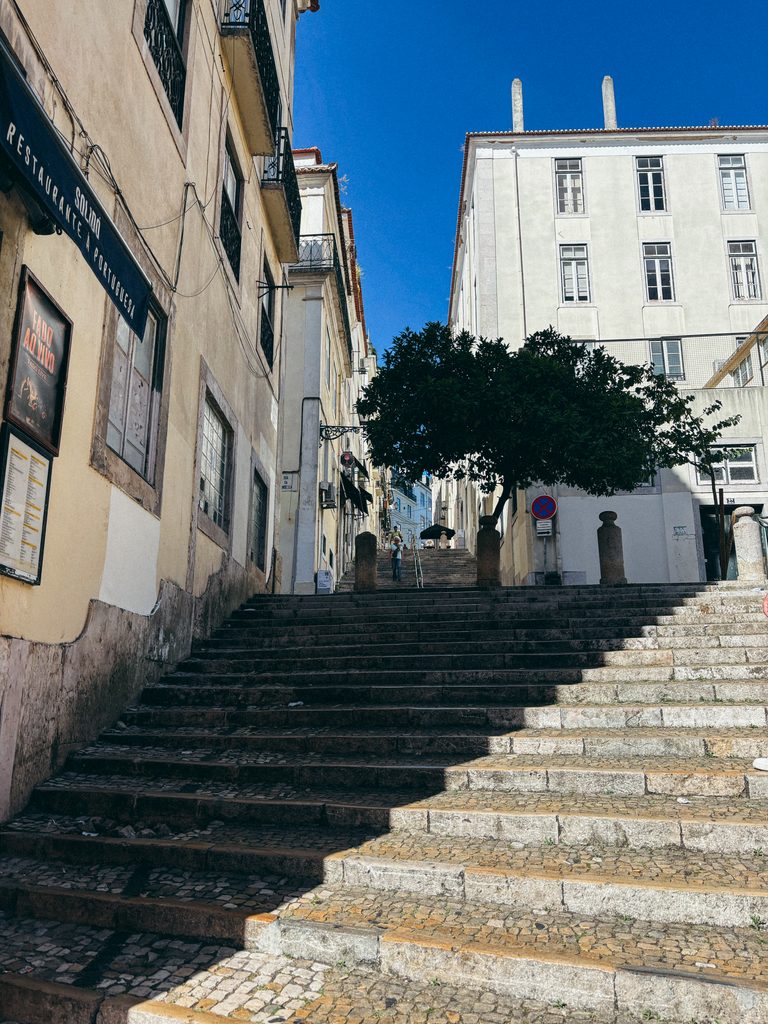 Steep stone steps in Lisbon's historic centre, an important consideration when choosing where to stay in Lisbon