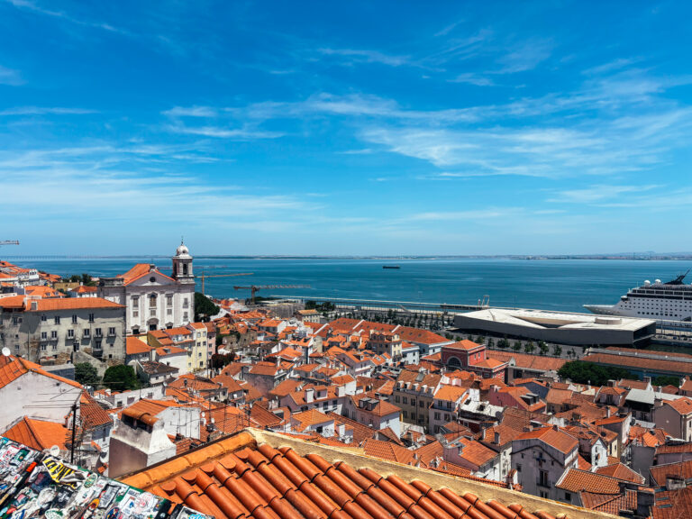 View over Lisbon rooftops and the Tagus River during our one day in Lisbon.
