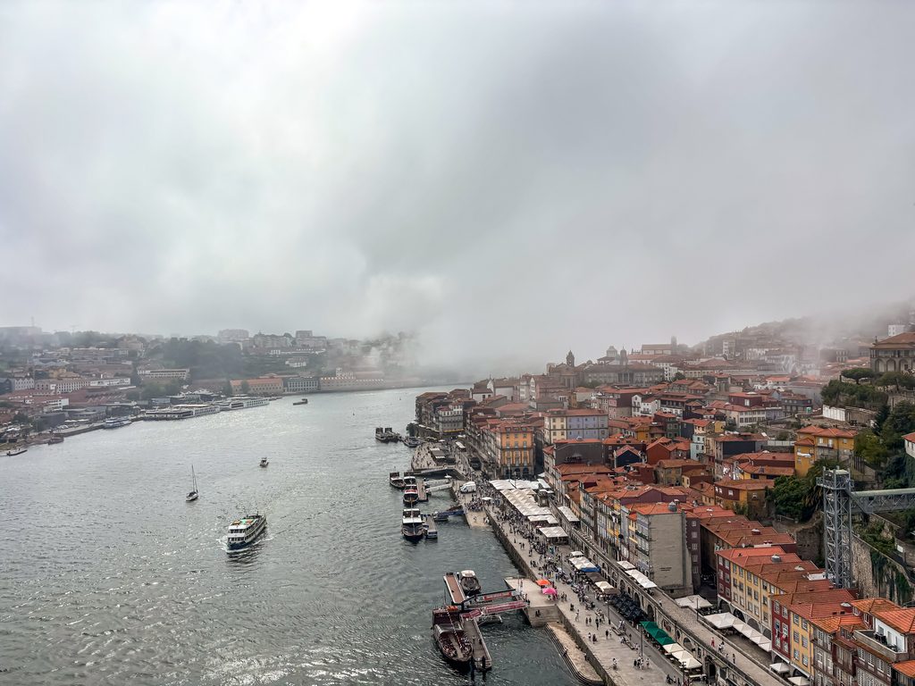 Ribeira and the Douro River in Porto partly covered in low cloud and mist