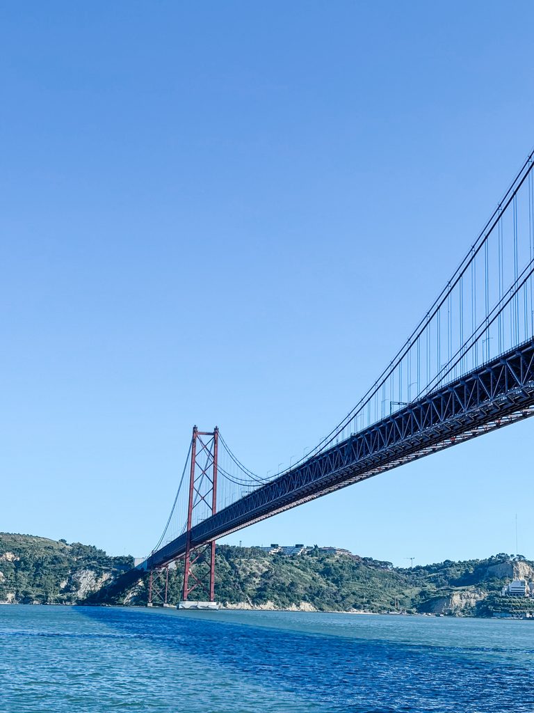 25 de Abril Bridge seen from a Tagus River cruise in Lisbon.