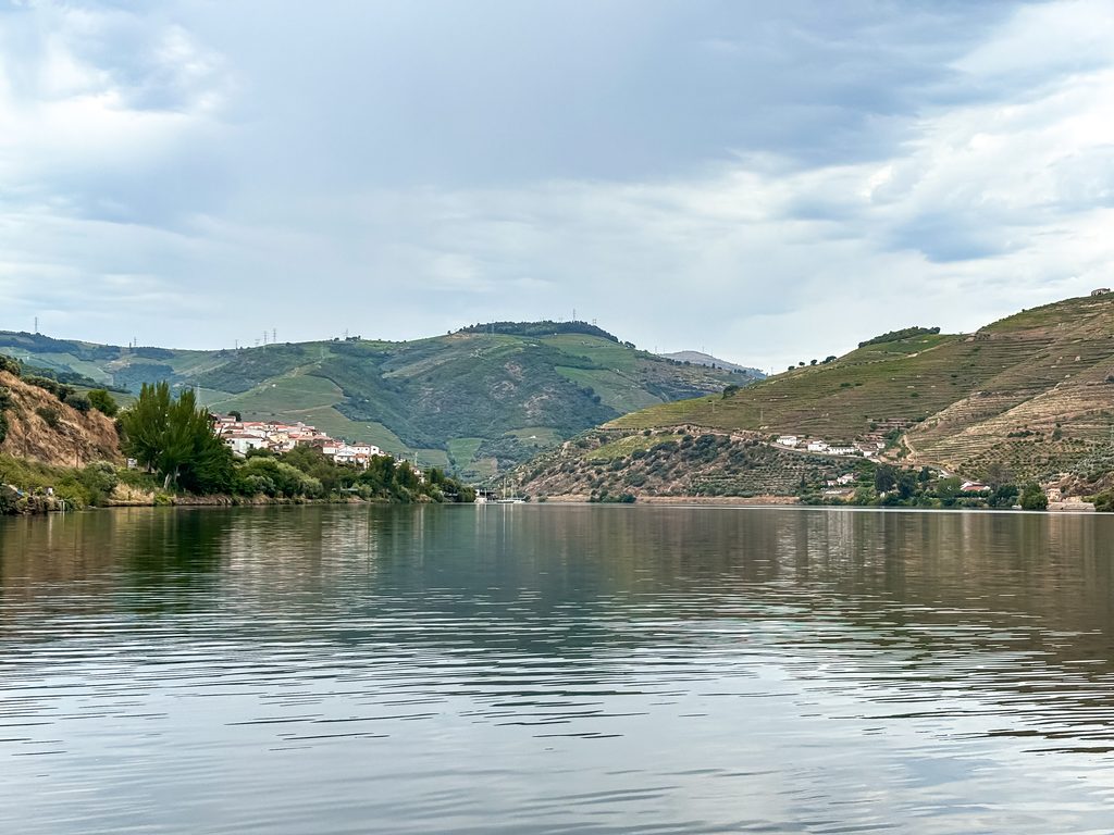 Douro River and vineyard-covered hills while deciding where to stay in the Douro Valley