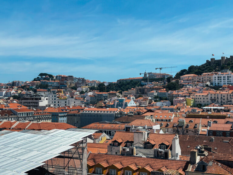 Lisbon rooftops and São Jorge Castle above the historic centre, one of the main areas to consider when deciding where to stay in Lisbon